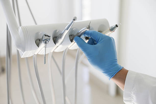 Professional Emergency Dentist technician working in Cologne, NJ